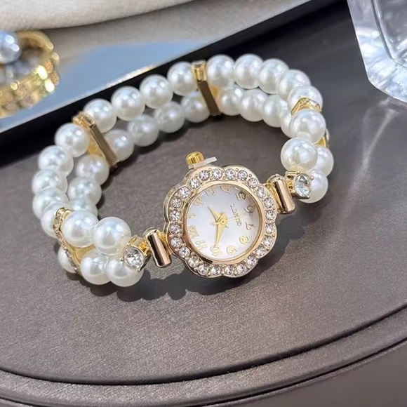 Anthropologie Accessories - Women’s 18k gold color Stainless steel  Panther’s watch Pearl and diamond